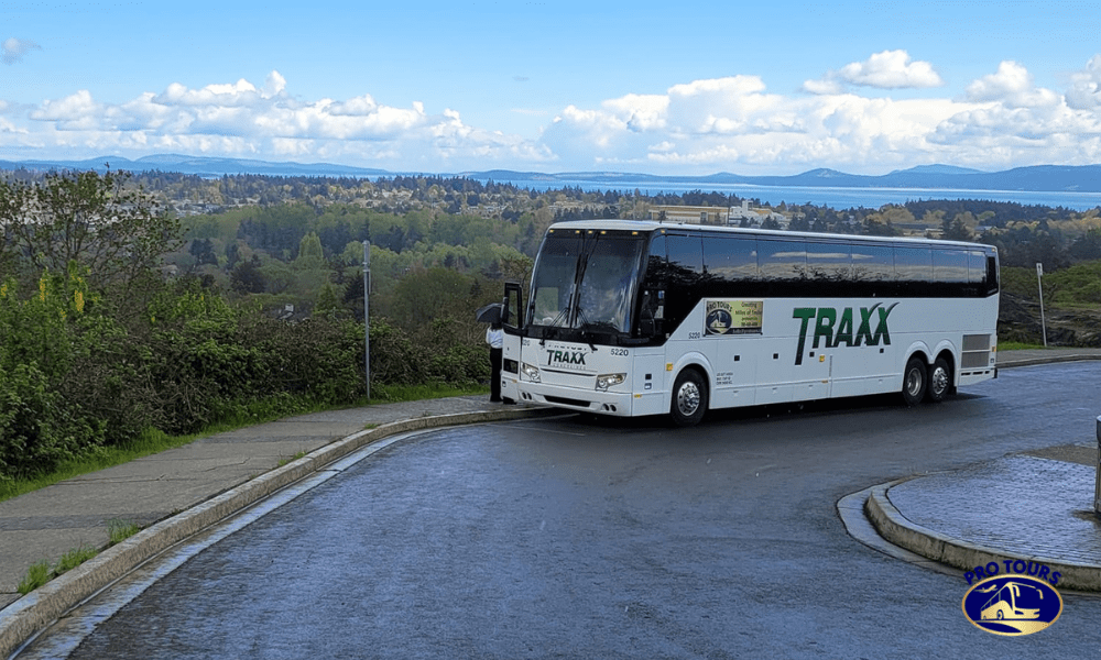 Pro Tours motorcoach traveling through scenic landscapes on a guided bus tour