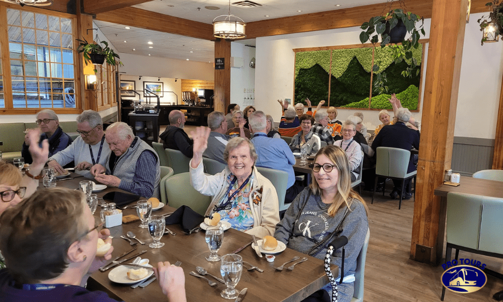 Pro Tours travelers sharing a meal together on a guided bus tour