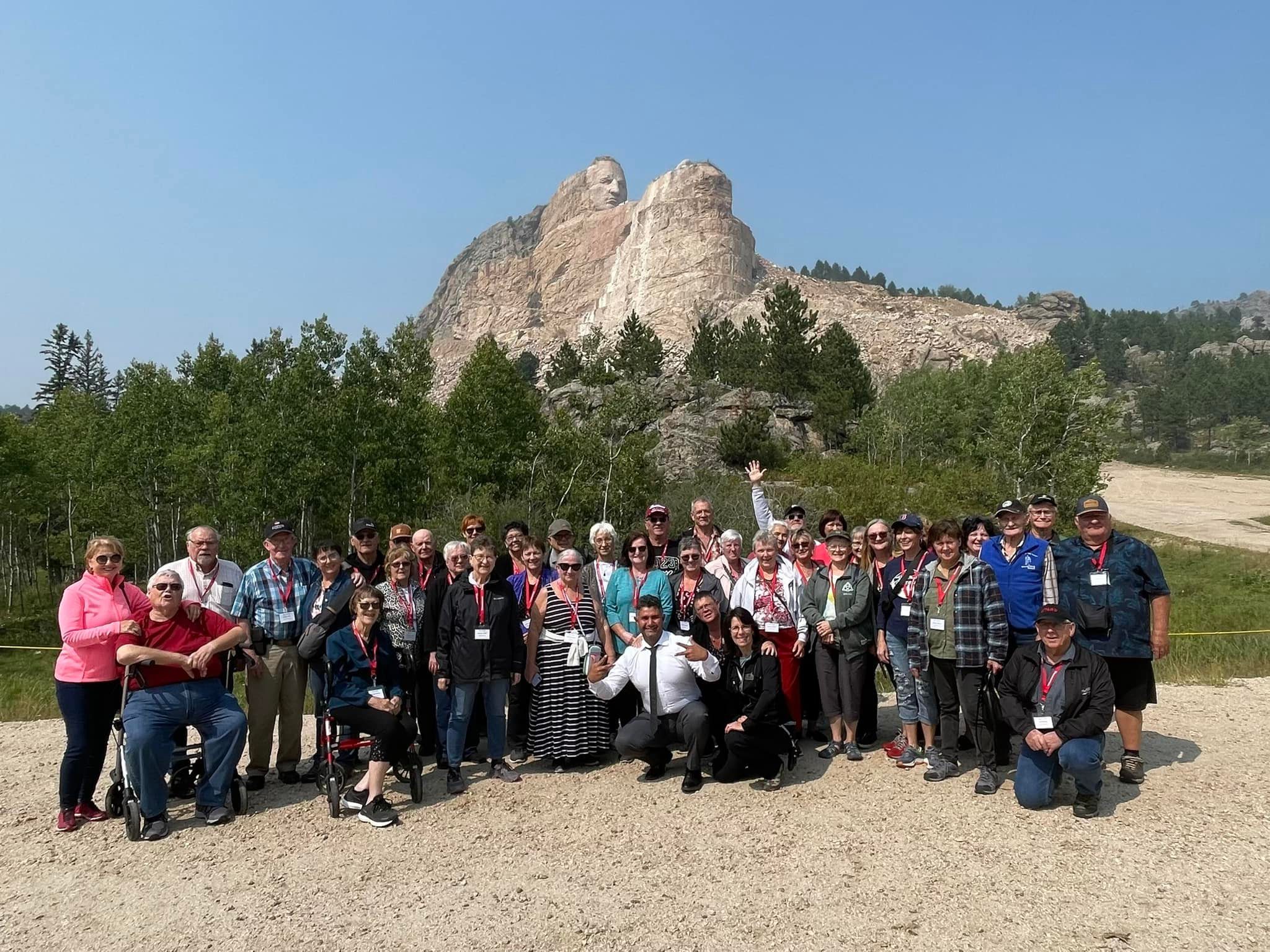 A shared experience and a beautiful backdrop. You can almost feel the energy of the group as they enjoy a day full of stories and sights.