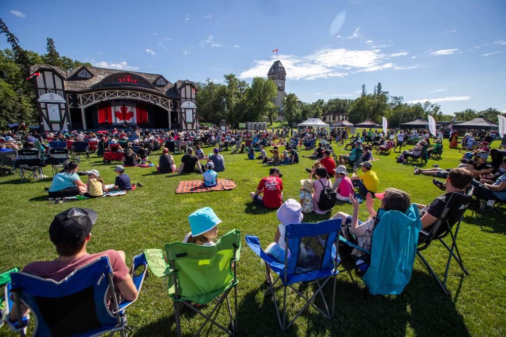 Crowd watching an outdoor performance at the Icelandic Festival of Manitoba in Gimli