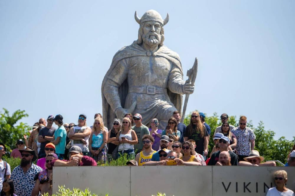 Visitors gathered near the Viking statue in Gimli during the Icelandic Festival of Manitoba